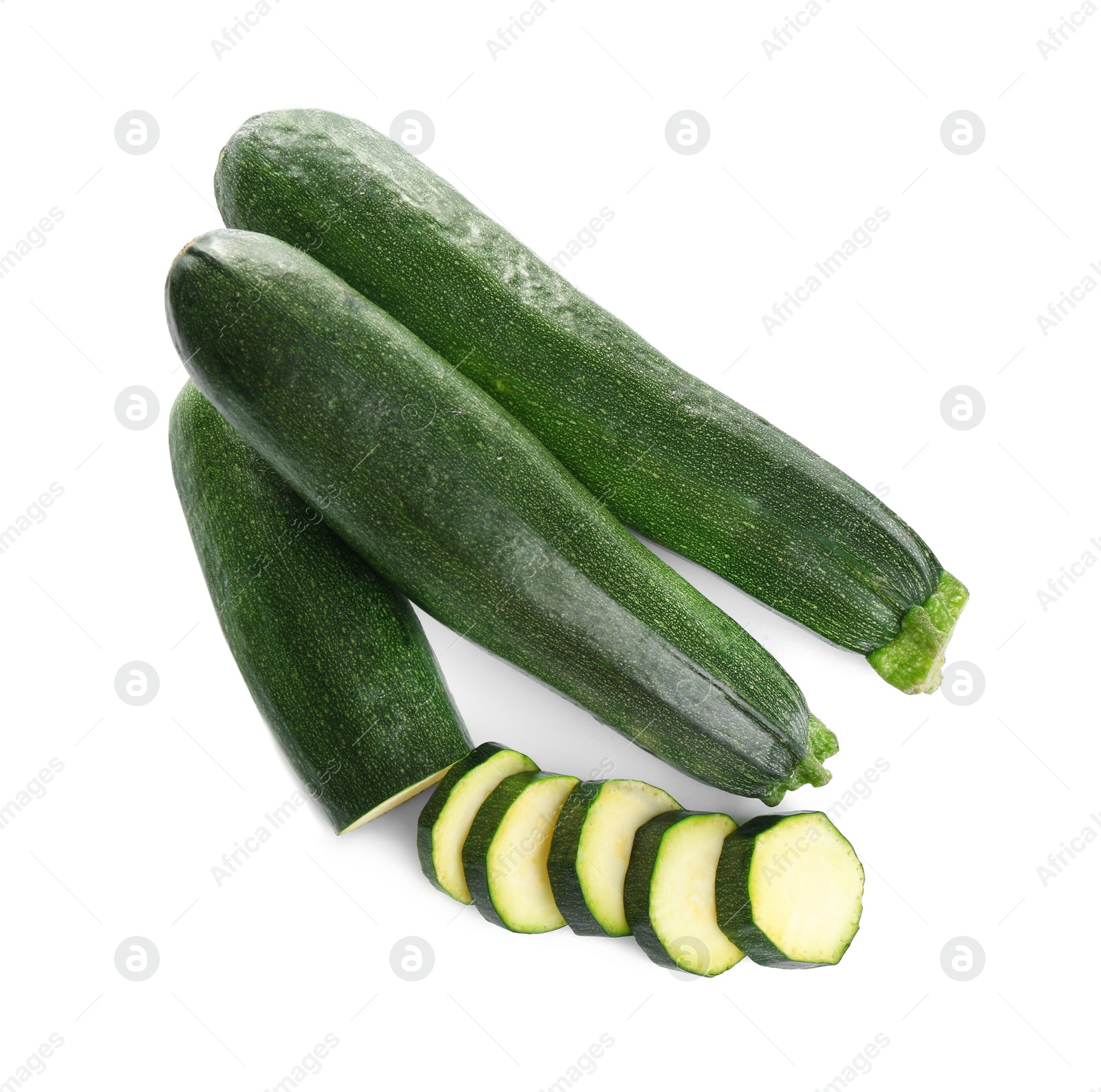 Photo of Fresh ripe green zucchinis isolated on white, top view