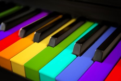 Image of Piano keys in rainbow colors, closeup view