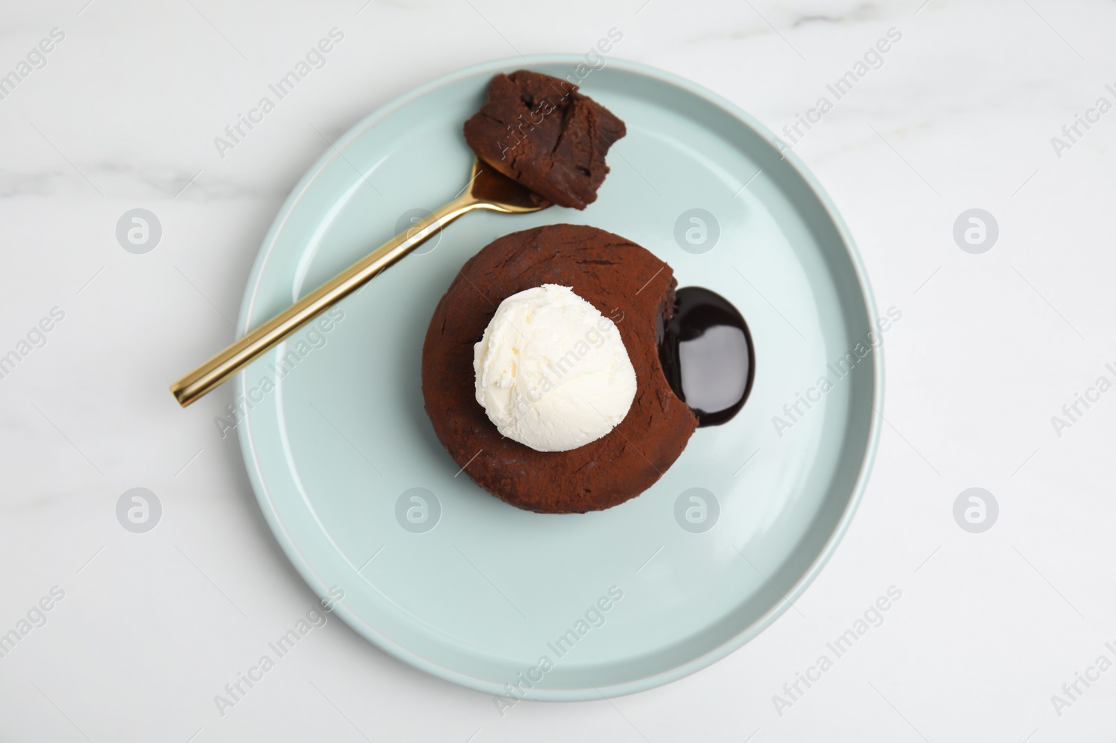 Photo of Delicious fresh fondant with hot chocolate and ice cream on white marble table, top view