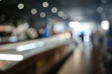 Blurred view of modern shopping mall interior