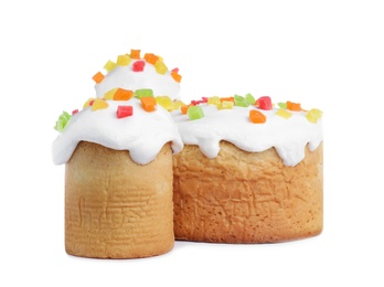 Photo of Traditional decorated Easter cakes on white background