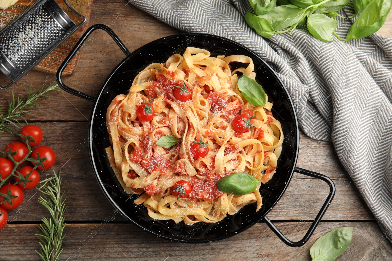 Photo of Flat lay composition with tasty pasta on wooden table