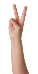 Playing rock, paper and scissors. Woman making scissors with her fingers on white background, closeup