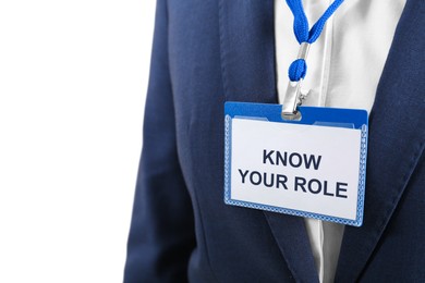 Photo of Office worker wearing badge with phrase Know Your Role, closeup. Corporate social responsibility