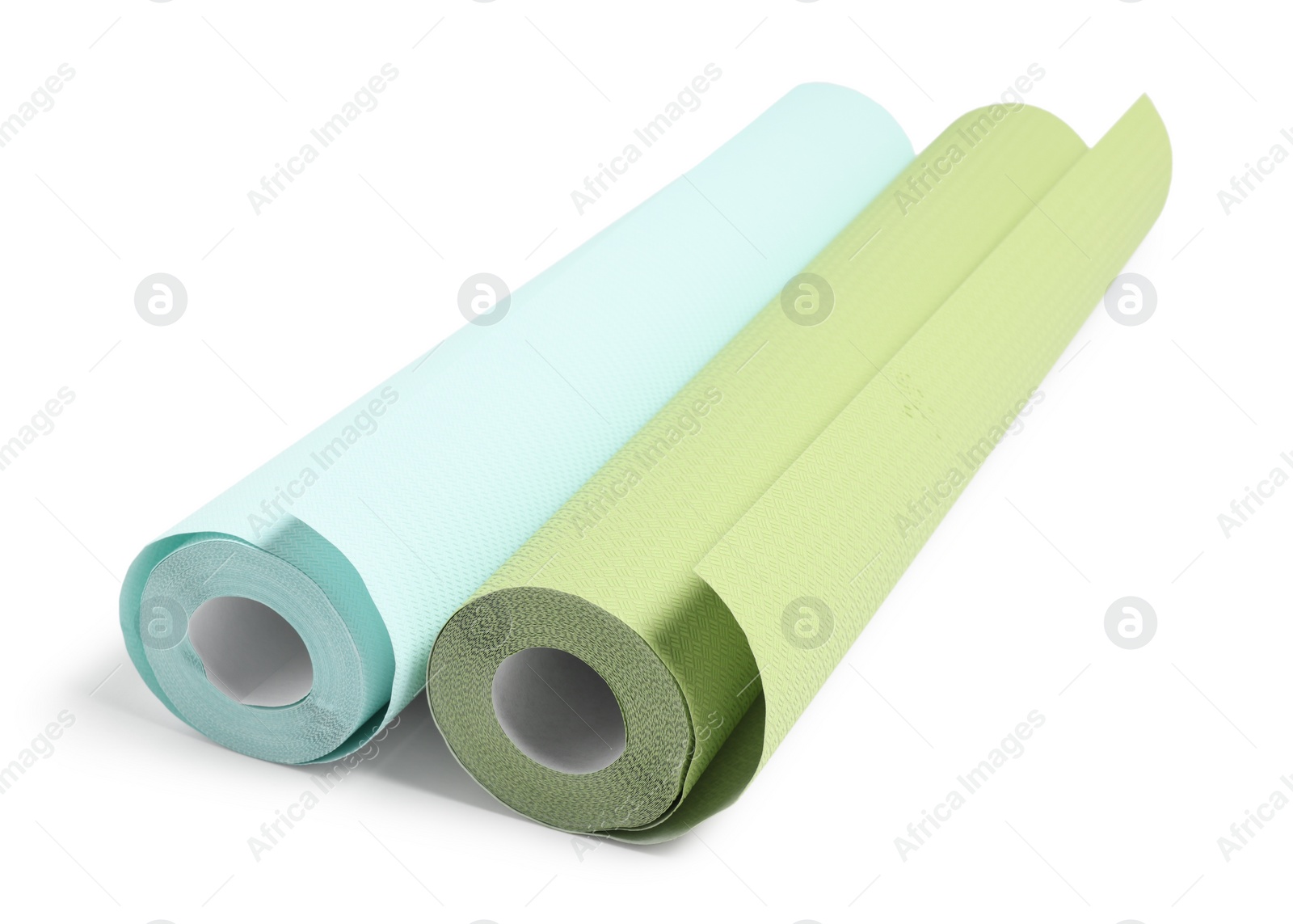 Photo of Two colorful wallpaper rolls isolated on white