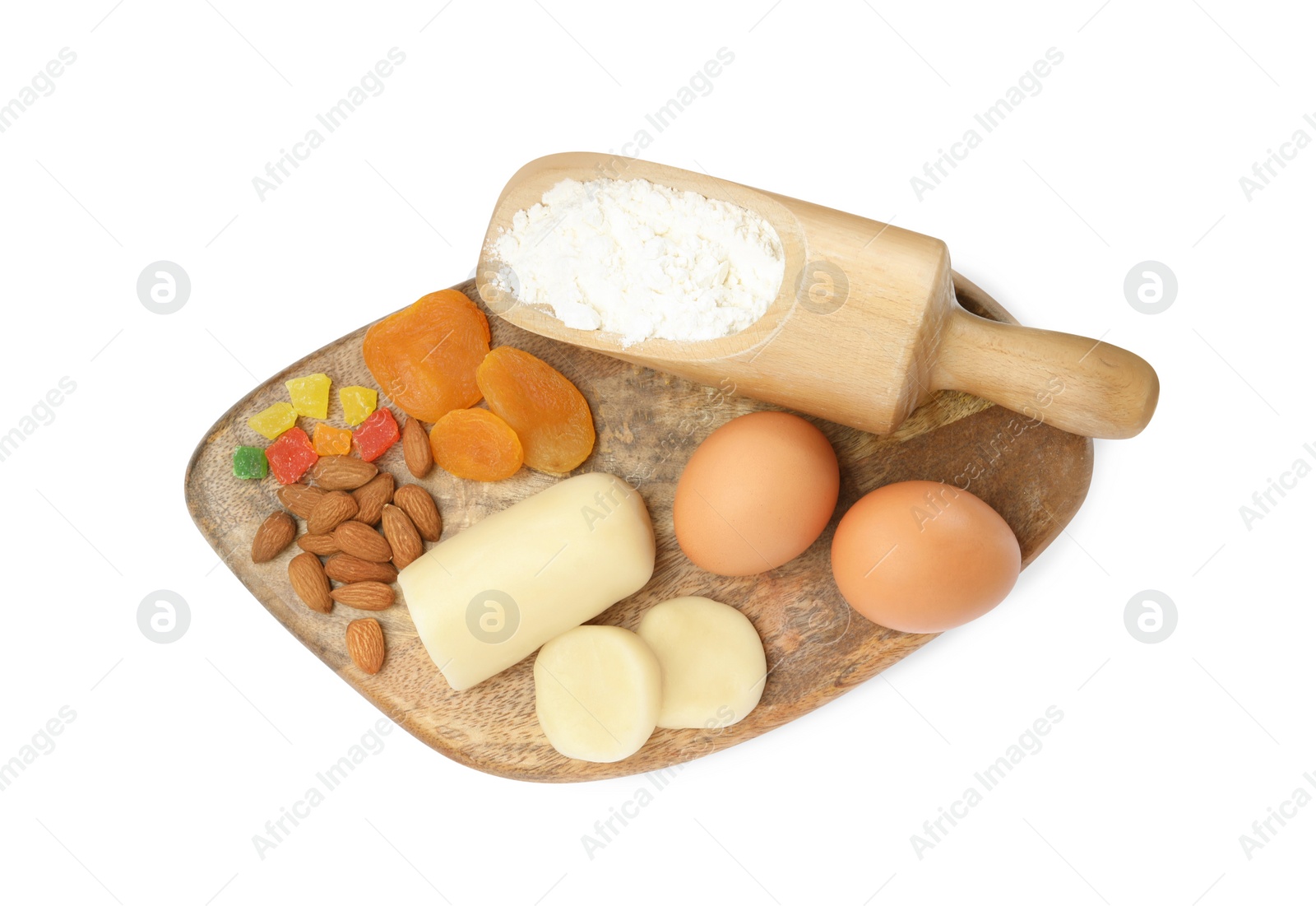 Photo of Marzipan and other ingredients for homemade Stollen on white background, top view. Baking traditional German Christmas bread