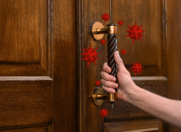 Image of Abstract illustration of virus and man opening wooden door, closeup. Avoid touching surfaces in public spaces during COVID-19 pandemic