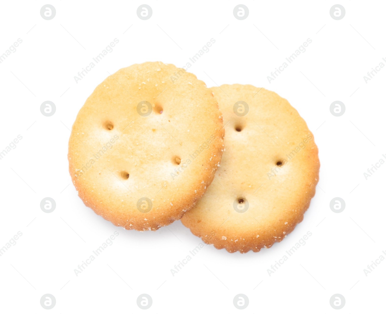 Photo of Crispy crackers isolated on white, top view. Delicious snack