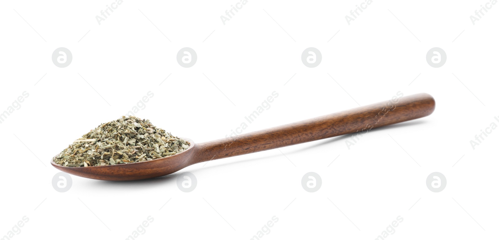 Photo of Wooden spoon with dried parsley on white background