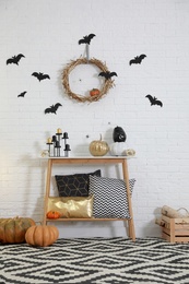 Photo of Stylish interior of room decorated for Halloween holiday