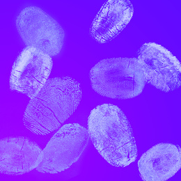 Image of Set of different fingerprints on color background 