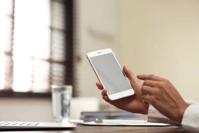 Photo of Business trainer working at table in office, closeup