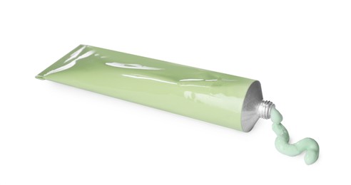 Tube with squeezed hand cream on white background