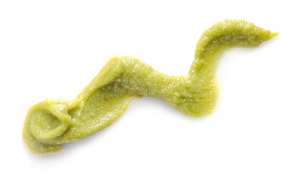 Photo of Delicious spicy wasabi on white background, top view. Traditional sauce