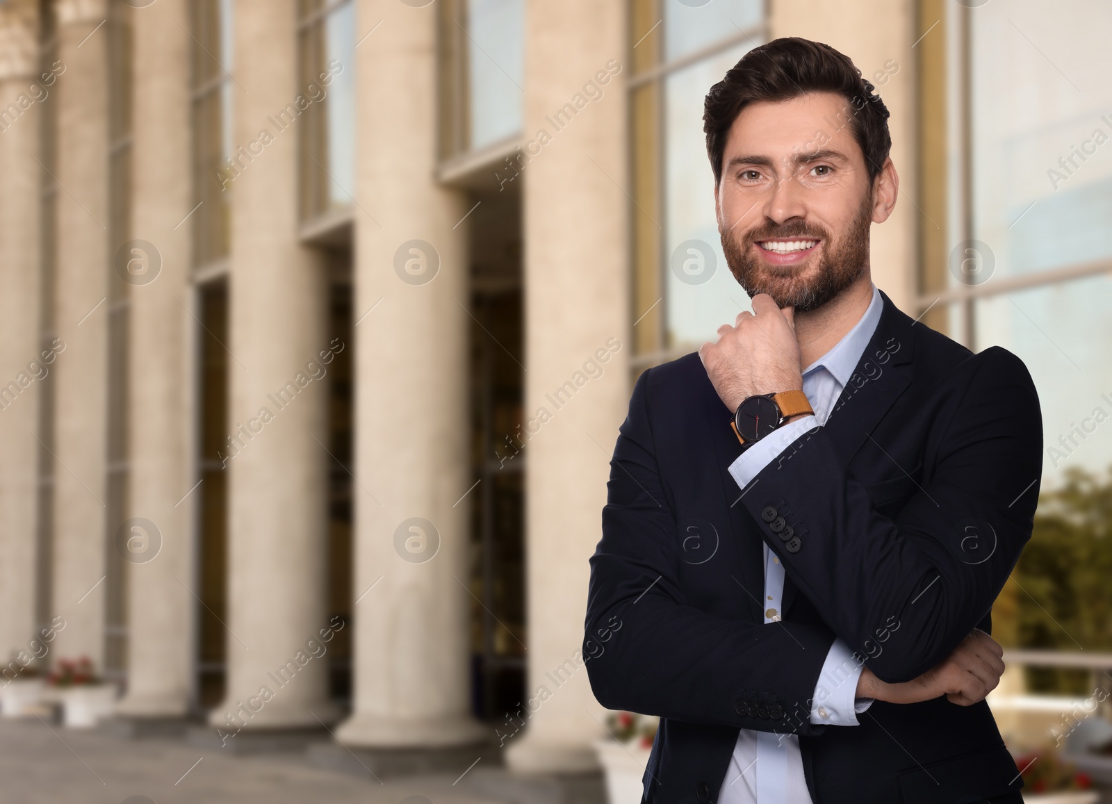 Image of Successful lawyer near building outdoors, space for text