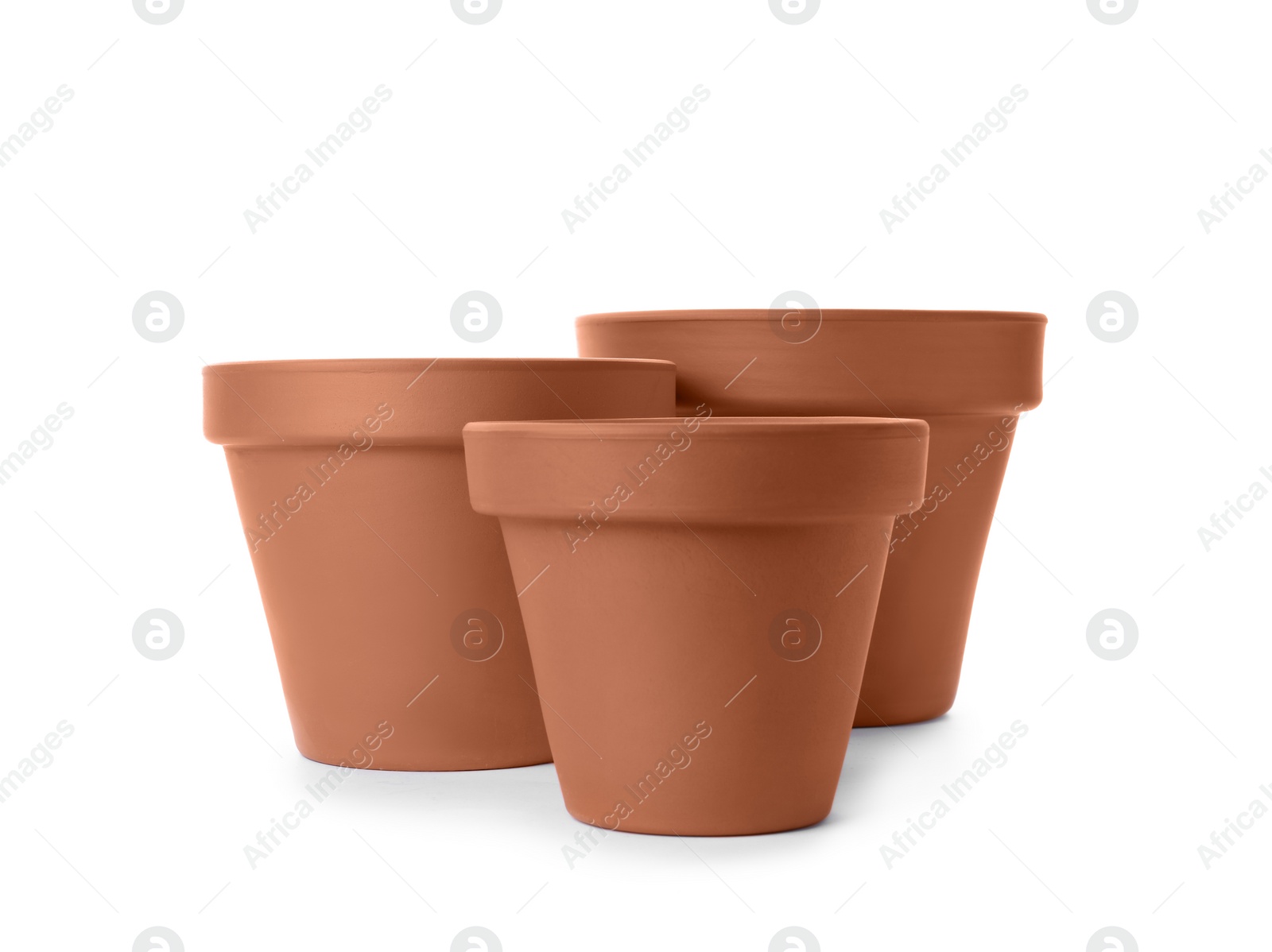 Photo of Stylish terracotta flower pots isolated on white