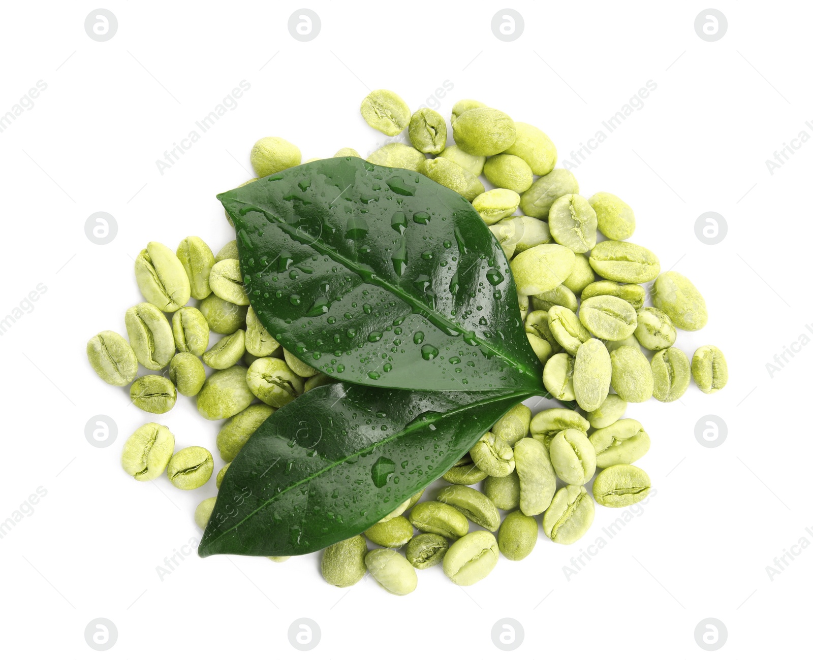 Photo of Green coffee beans and fresh leaves on white background, top view