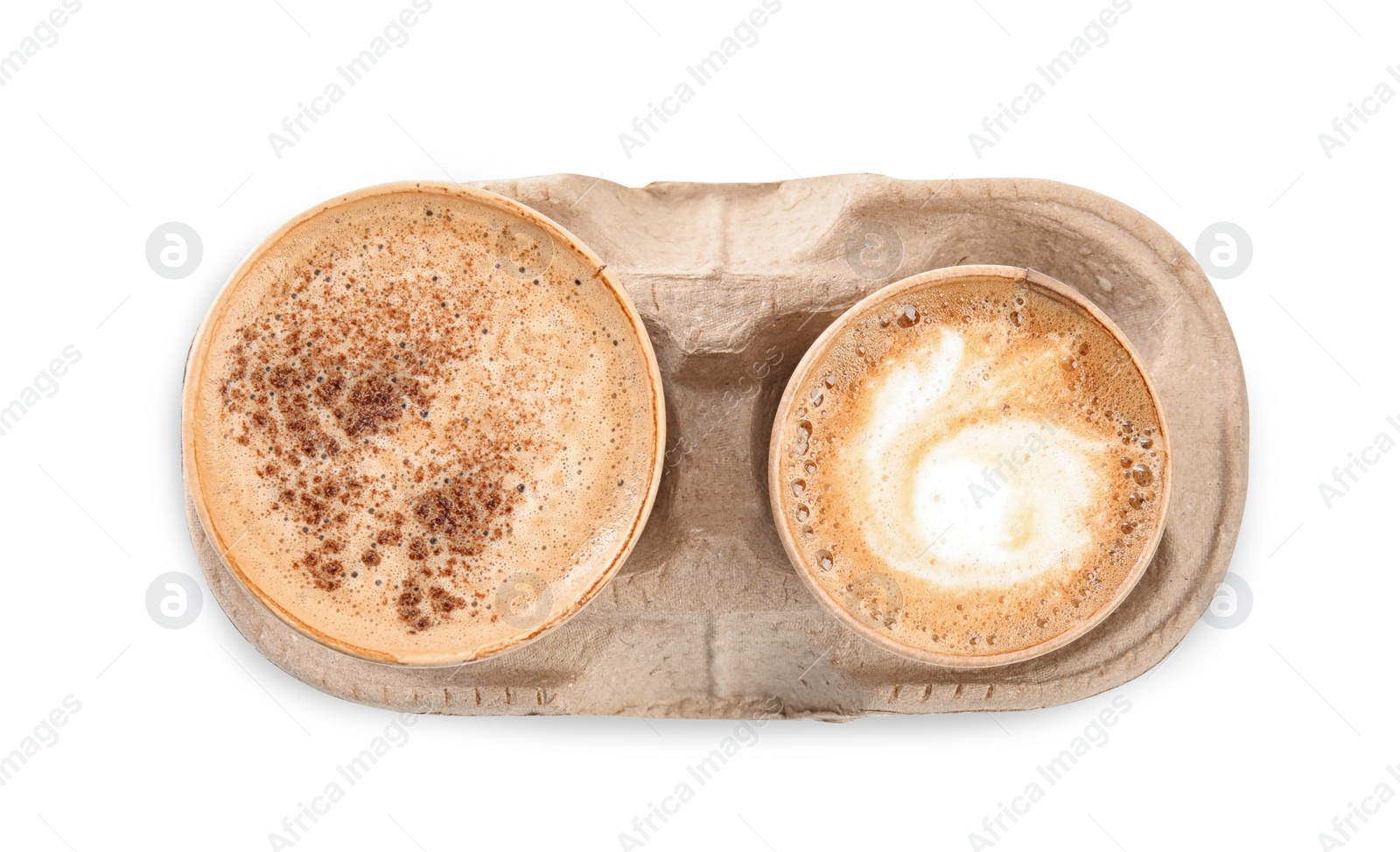 Photo of Takeaway paper cups with coffee in cardboard holder on white background, top view