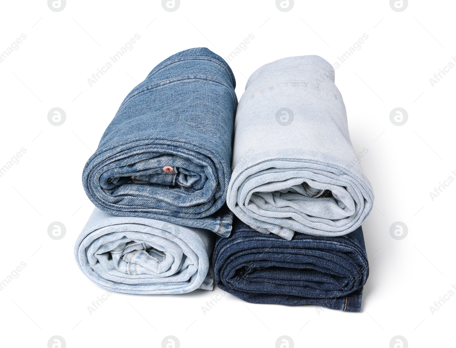 Image of Different stylish rolled jeans isolated on white