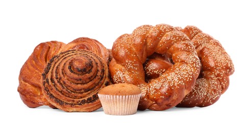 Different tasty freshly baked pastries isolated on white