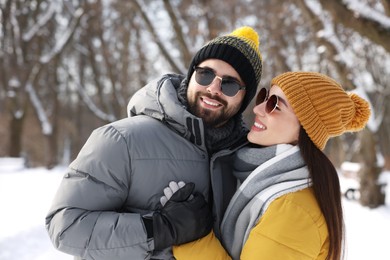 Beautiful happy couple spending time together on winter day