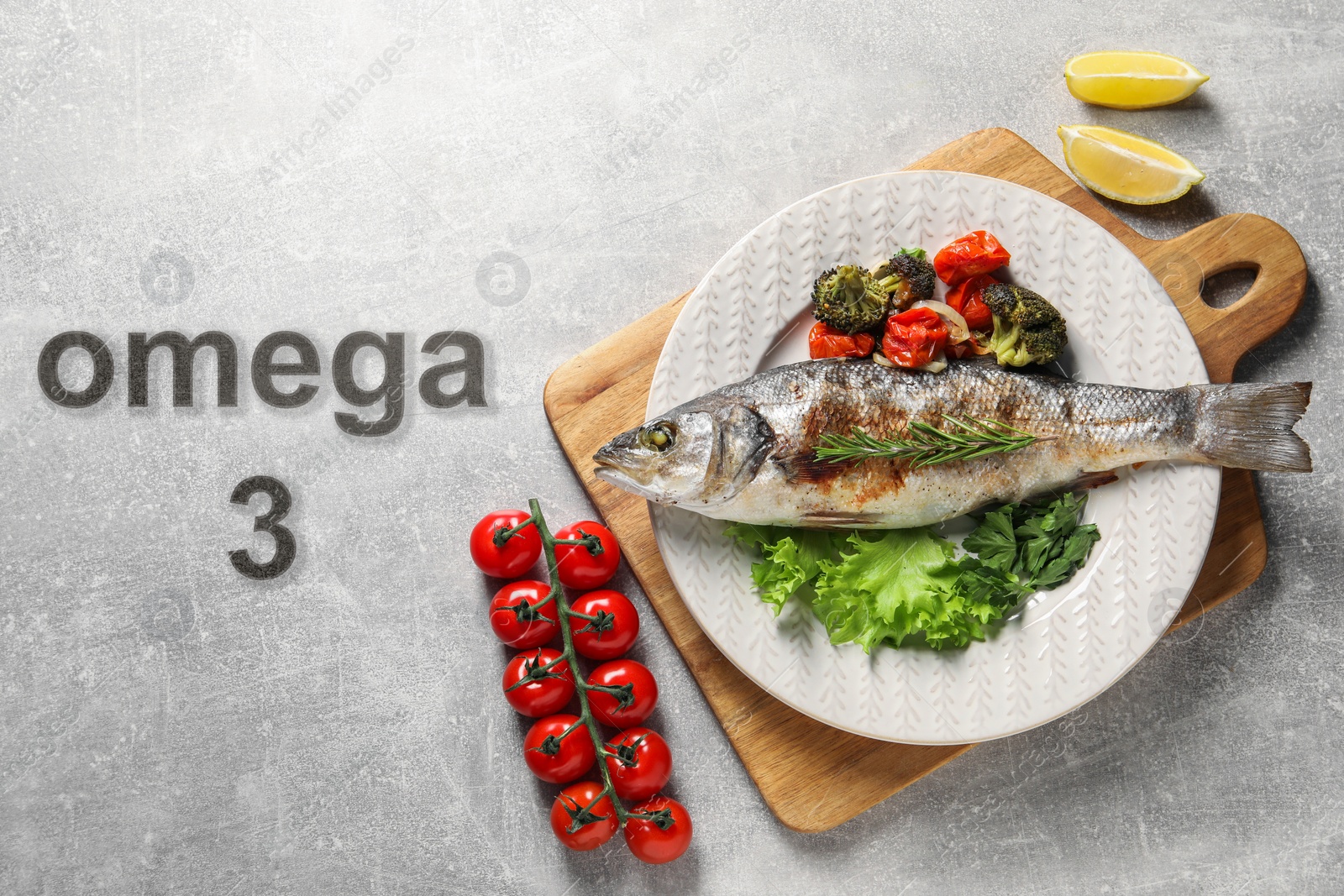 Image of Omega 3. Baked fish with vegetables and rosemary on grey table, flat lay