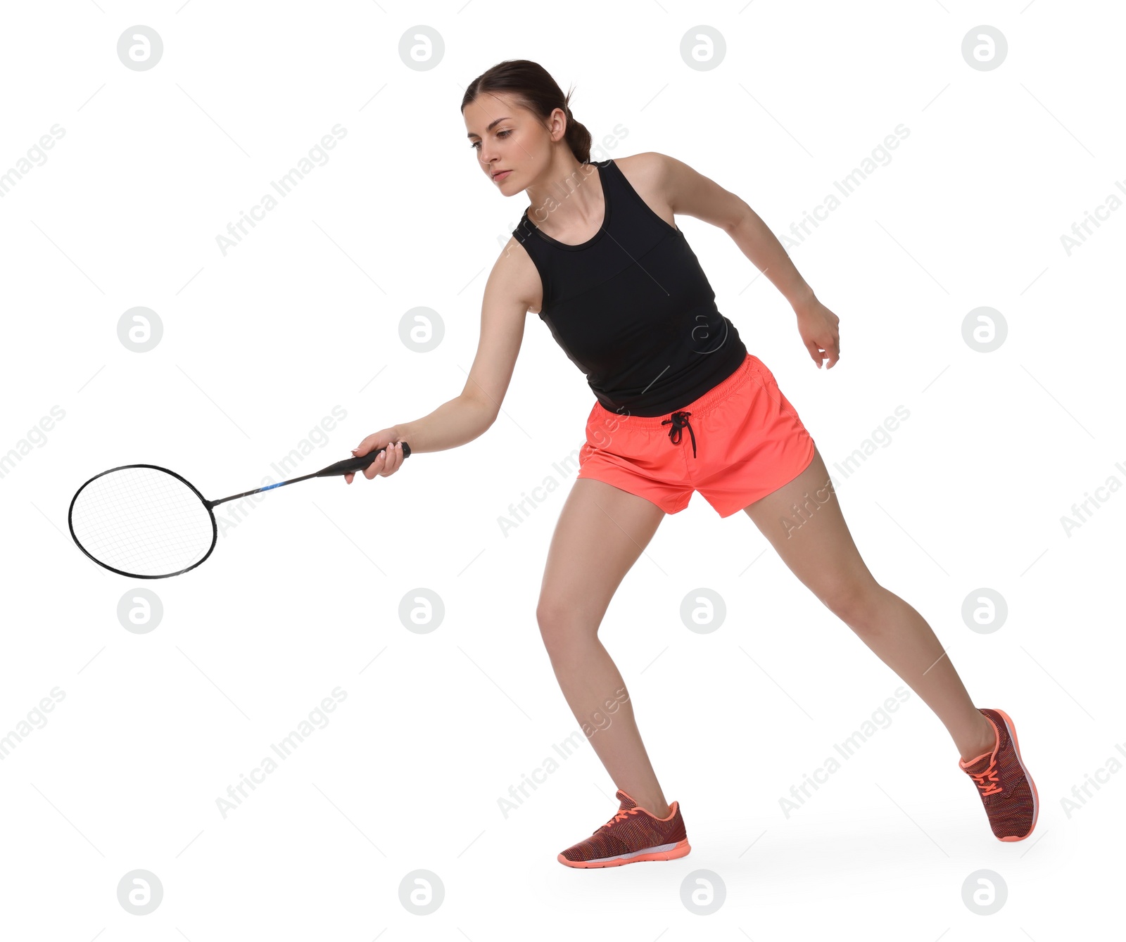 Photo of Young woman playing badminton with racket on white background