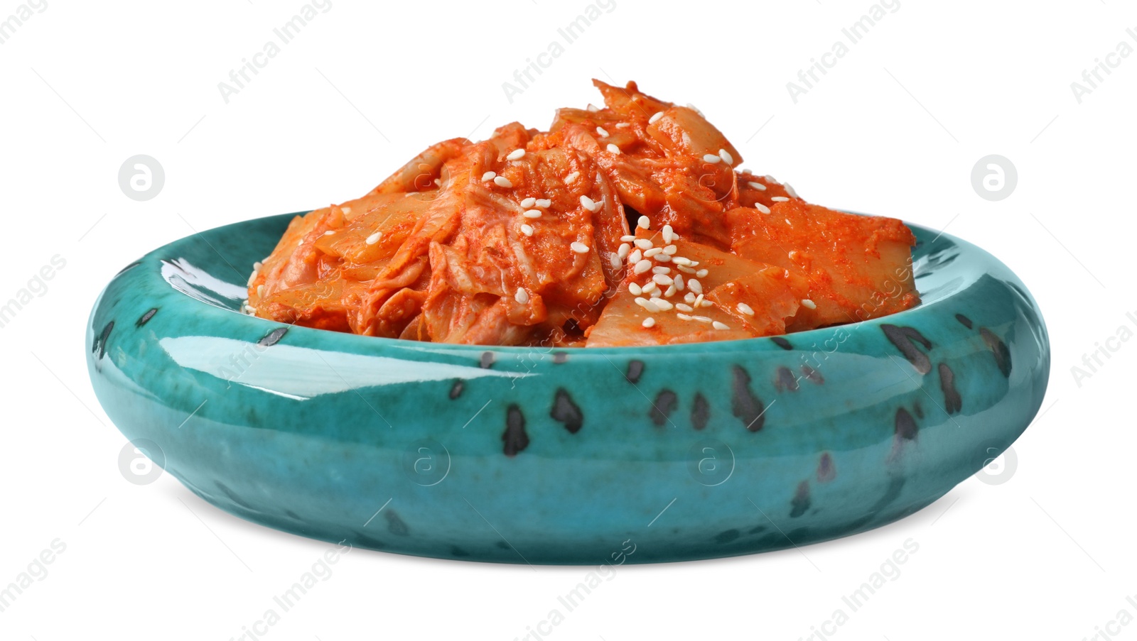 Photo of Plate of spicy cabbage kimchi isolated on white