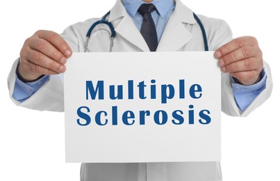 Doctor holding paper with text Multiple Sclerosis on white background, closeup
