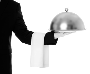 Photo of Waiter holding metal tray with lid on white background, closeup