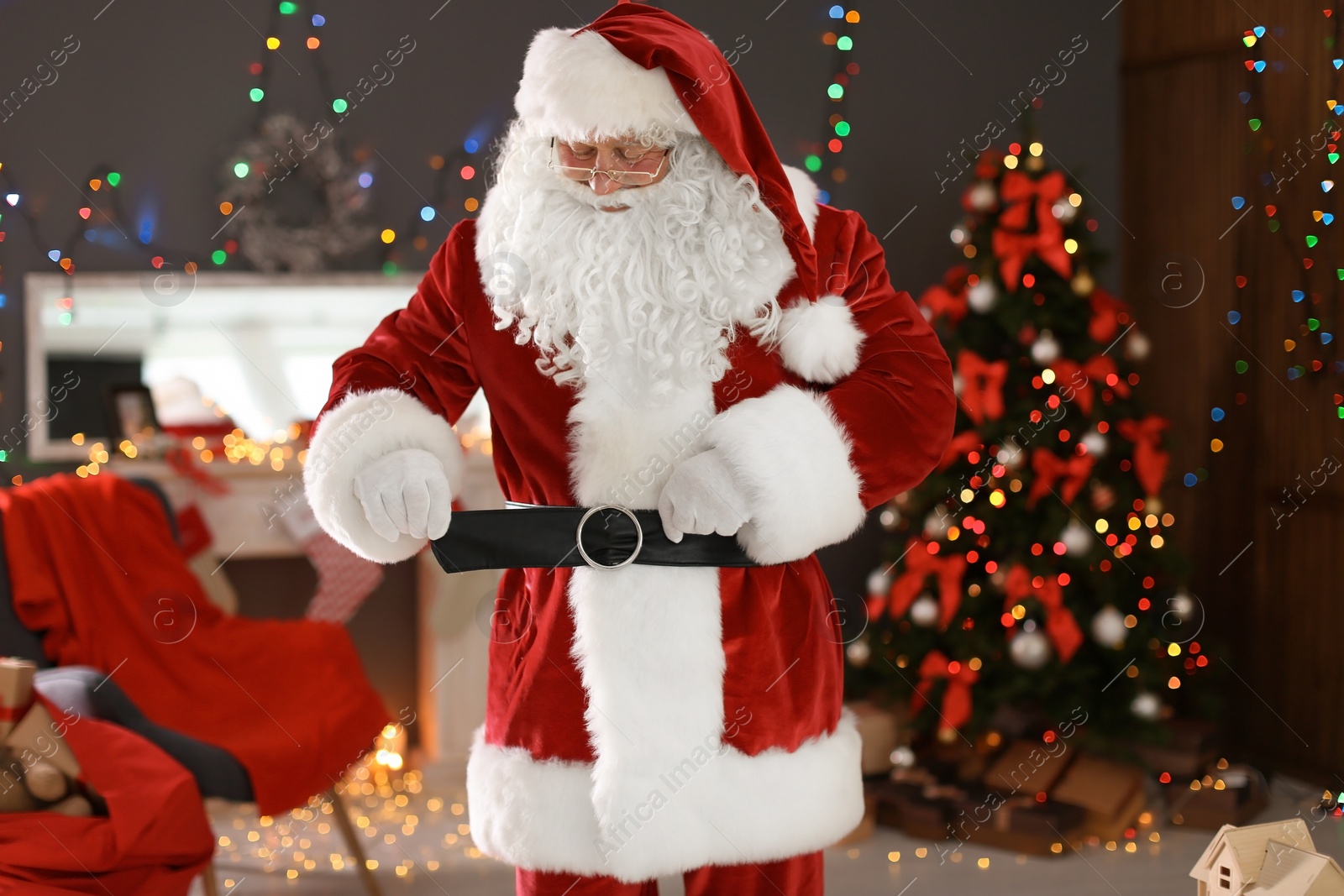 Photo of Authentic Santa Claus in traditional costume indoors