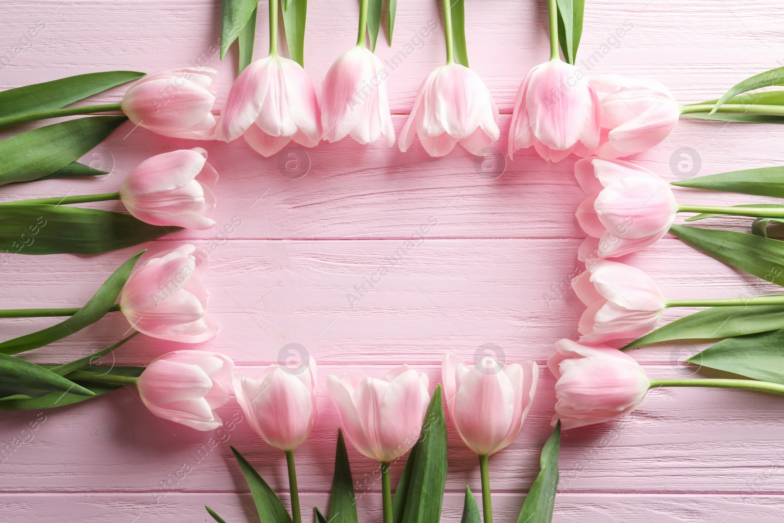 Photo of Composition with beautiful tulips for Mother's Day on wooden background, top view