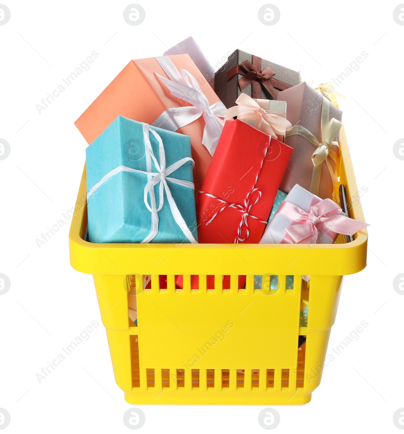 Photo of Shopping basket full of gift boxes on white background