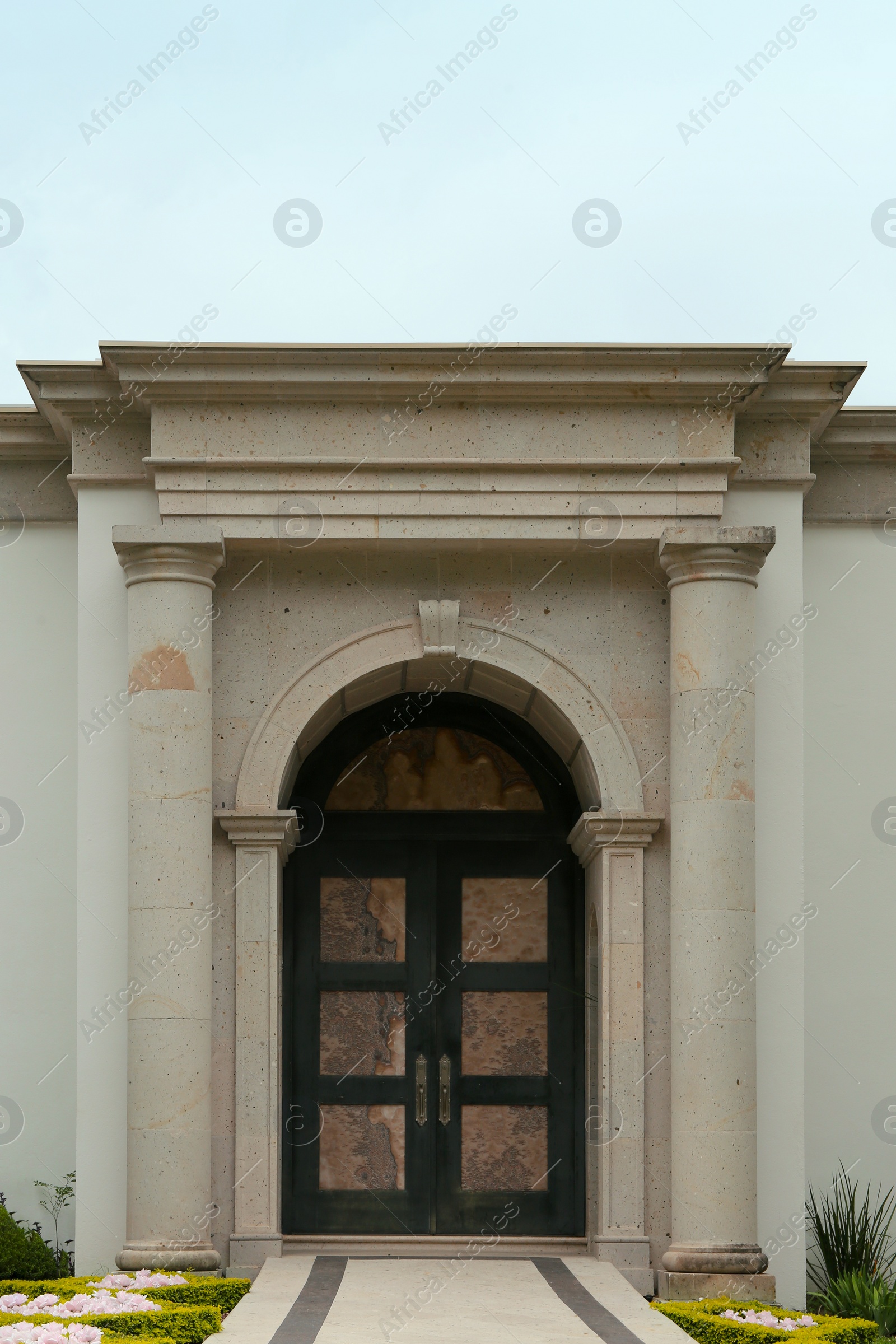 Photo of Entrance of house with beautiful arched door