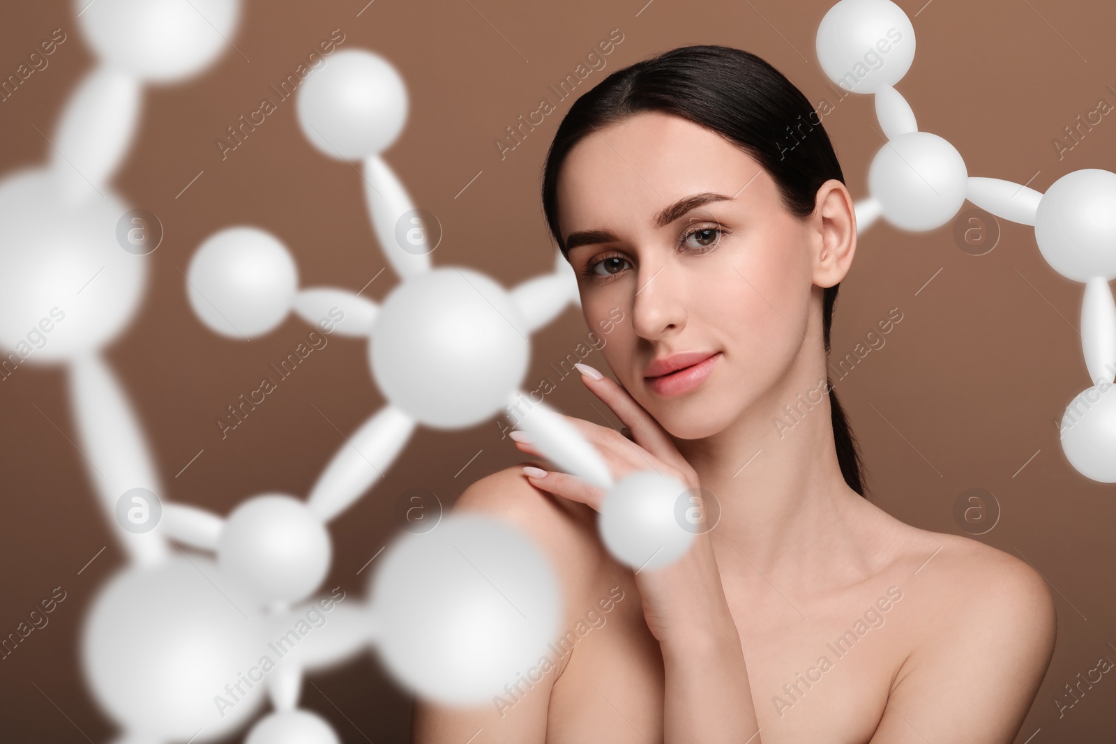 Image of Beautiful woman with perfect healthy skin and molecular model on brown background. Innovative cosmetology