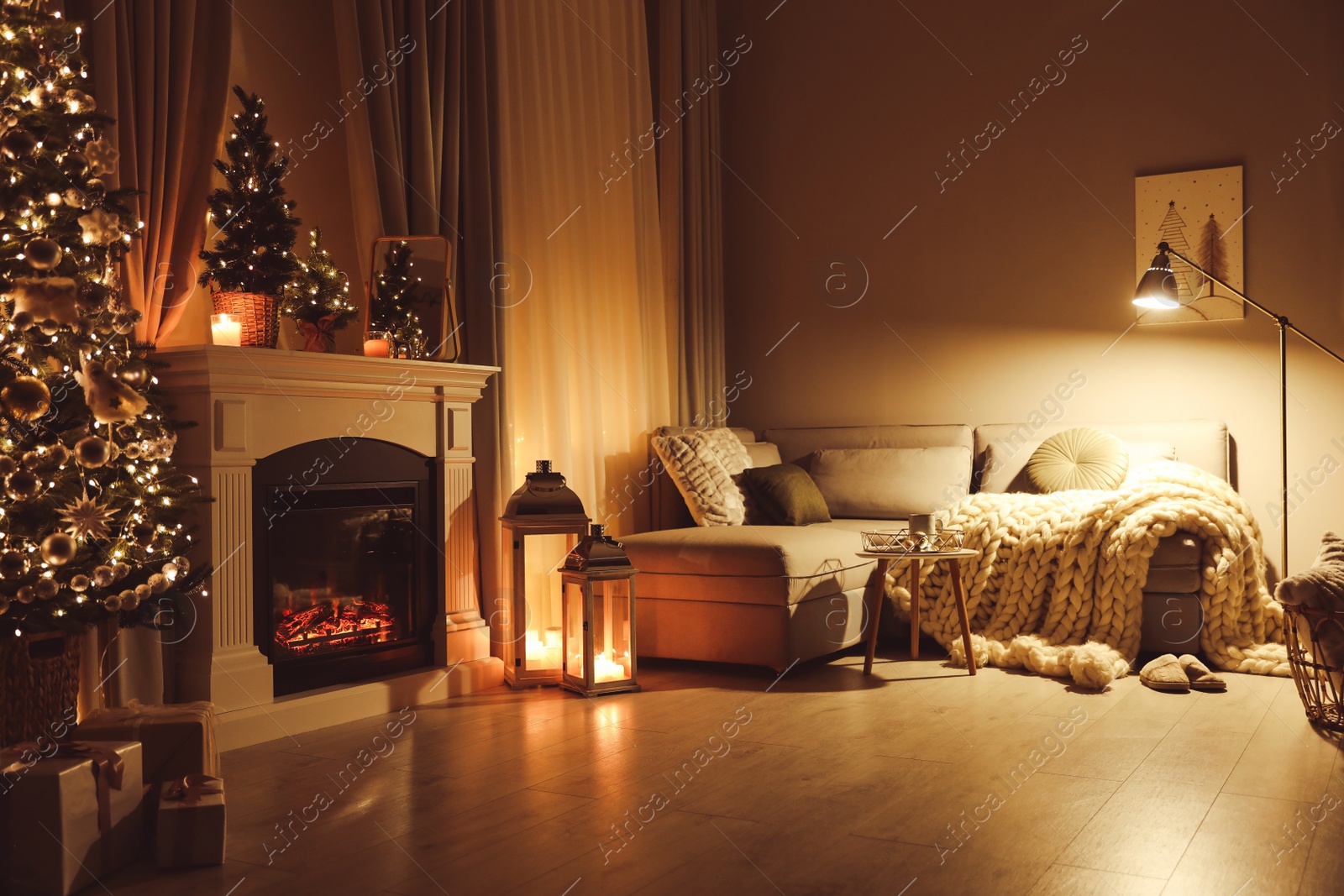 Photo of Stylish living room interior with beautiful fireplace, Christmas tree