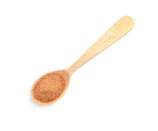 Photo of Natural coconut sugar in wooden spoon isolated on white, top view