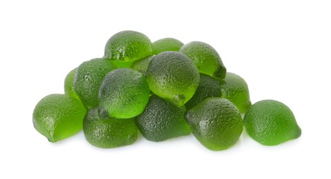 Pile of delicious gummy lime candies on white background