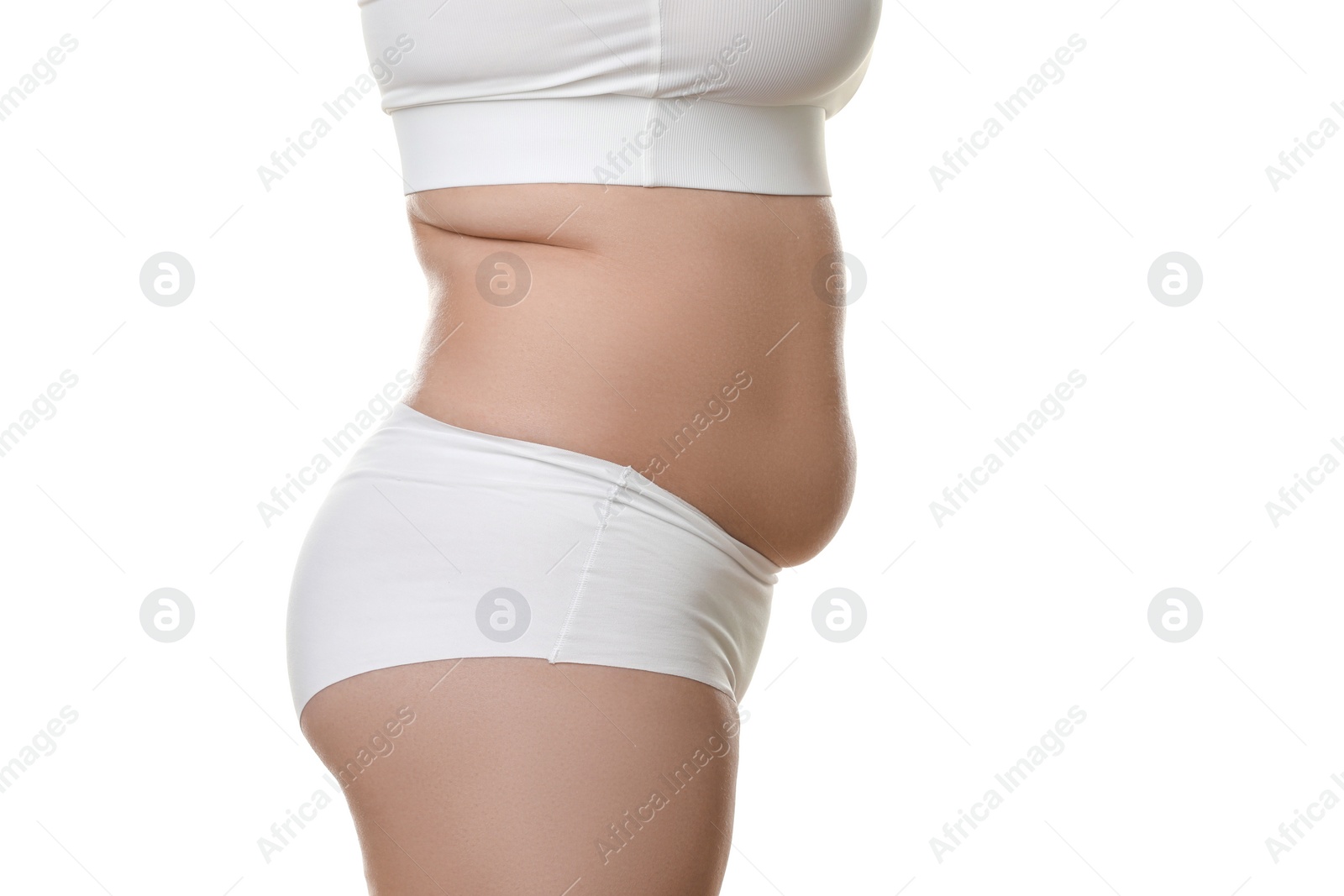 Photo of Woman with excessive belly fat on white background, closeup. Overweight problem