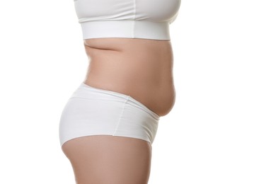 Photo of Woman with excessive belly fat on white background, closeup. Overweight problem