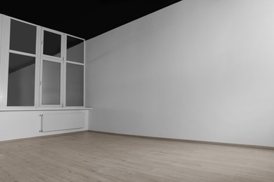 Photo of New empty room with clean windows and white walls