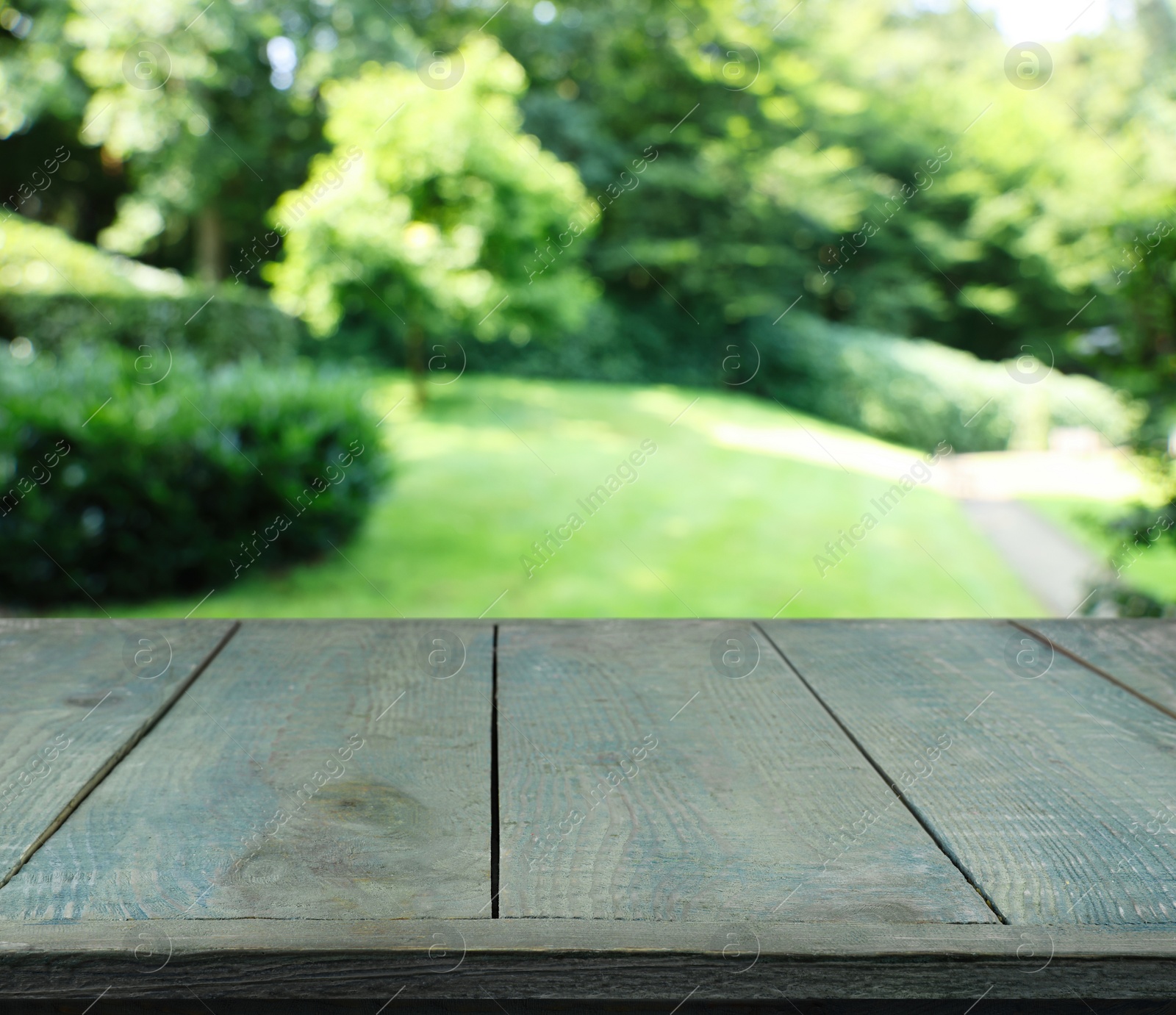 Image of Empty wooden surface outdoors on sunny day. Space for design