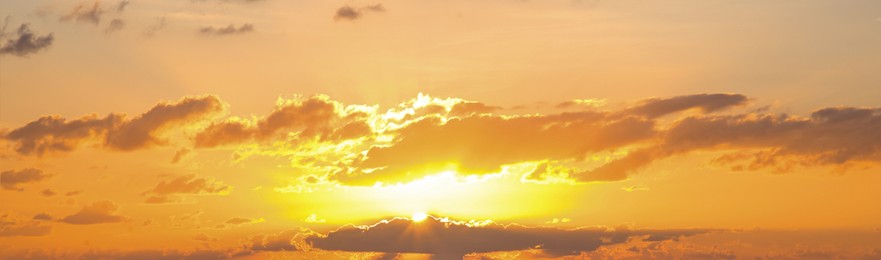 Image of Sun shining through clouds on beautiful sky, banner design