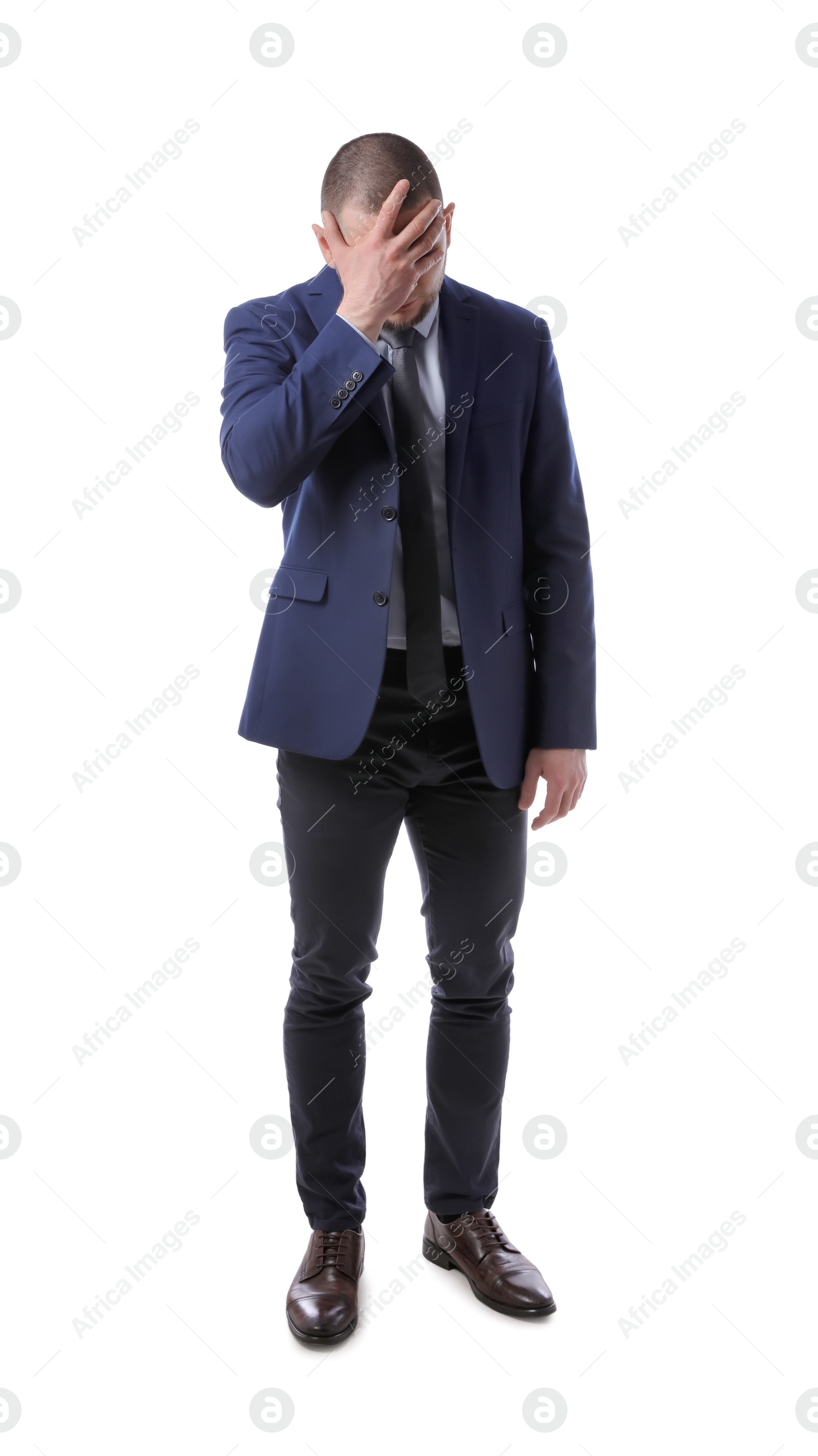 Photo of Upset man in suit on white background