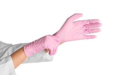 Doctor wearing medical gloves on white background