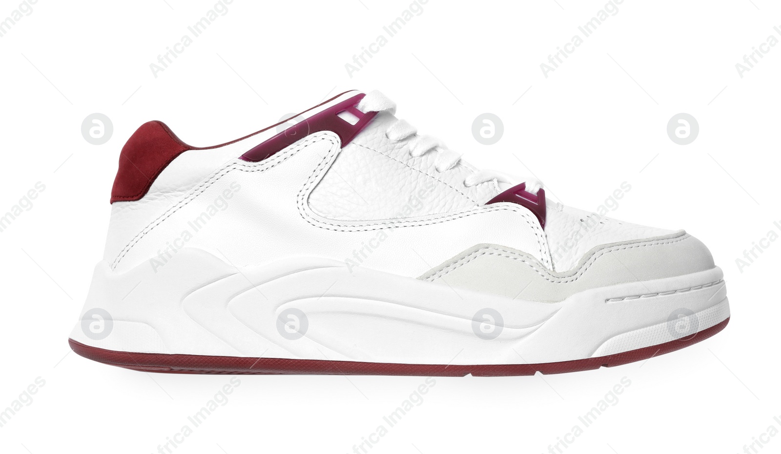 Photo of Stylish sneaker on white background, top view