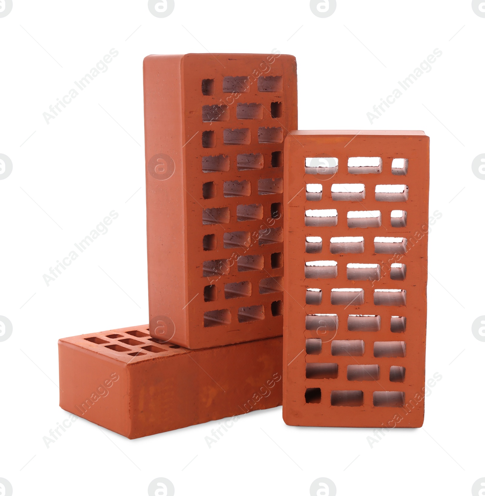 Photo of Red bricks on white background. Building material