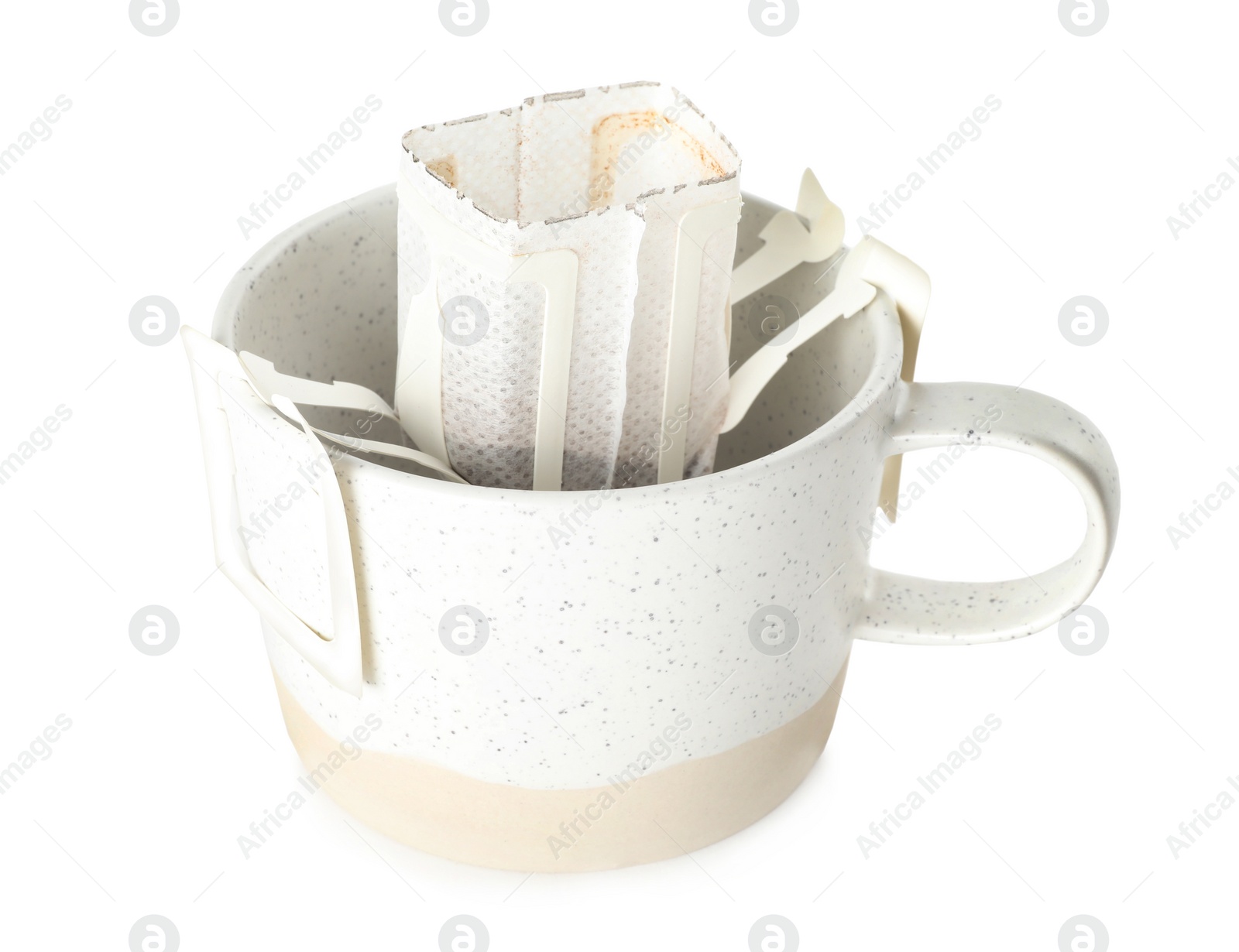 Photo of Cup with drip coffee bag isolated on white