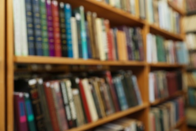 Blurred view of cabinets with books in library