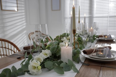 Festive table setting with beautiful tableware and decor indoors